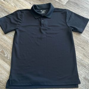 Brand new condition boys black golf shirt
